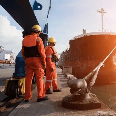 An image featuring maritime and rig crew members working on a vessel, showcasing the integration of employer of record, payroll, recruitment, workforce management, and manpower services in the maritime industry. The crew's activities highlight efficient deployment and management of personnel in specialized roles, ensuring smooth operations and compliance in maritime settings